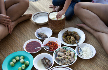 eating Northeastern Thai food with finger and main couese - obrazy, fototapety, plakaty