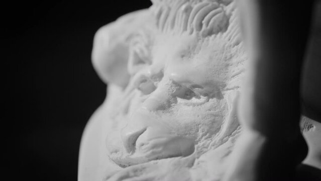 Closeup view of the detail of the base of the marble sculpture of Hercules and Lichas