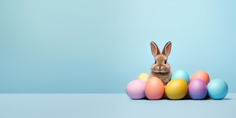 Colorful Easter eggs and cute bunny. Spring holiday pattern with eggs and rabbit. Easter backdrop for social media. Banner with blank text space. Pastel color. Generated by artificial intelligence