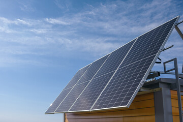 Naklejka premium Photovoltaic modules installed on the roof