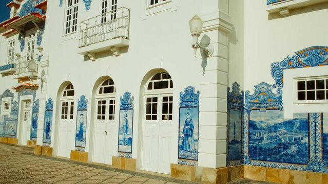 Blue tiles adorn the train station of Aveiro, Portugal, weaving stories of its maritime past through intricate mosaics and patterns