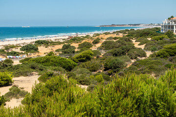 sand dunes that give access to La Barrosa beach in Sancti Petri, Cadiz, Spain