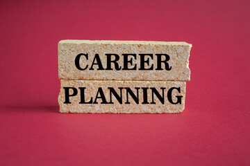 Career planning symbol. Concept words Career planning on beautiful brick blocks. Beautiful red background. Business, motivational career planning concept. Copy space.