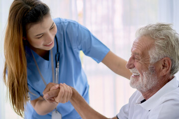 A old patient smile for happy from home healthcare service with a nurse to take care.