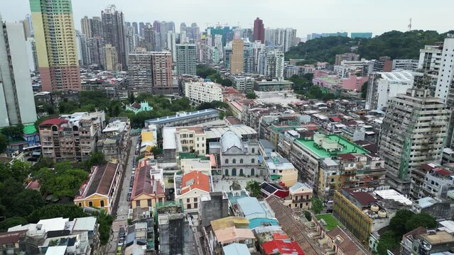 Macau, China: Aerial drone foootage of the Macau historical district, dating from the Portuguese colonial time, with the St. Lazarus church, one of the city oldest. 