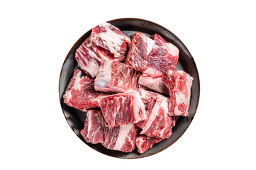 Raw diced beef and lamb marbled meat in kitchen steel tray. Black background. Top view