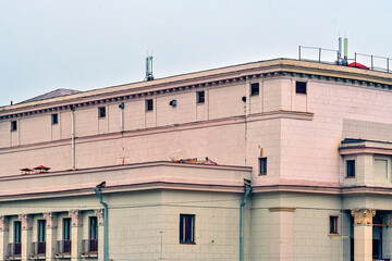 Fragment of the facade of a historic building on an autumn day