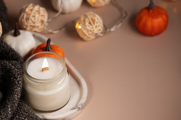 Aromatic burning candle and soft blanket, Cozy home, Relaxing spa vibes