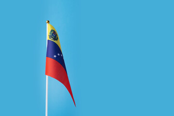 Venezuela flag on a blue background, copy space, independence national day of Venezuela, country...