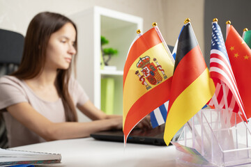 Learning a new language, young woman at the university studying foreign languages © yta