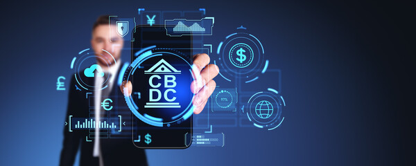 Man holding smartphone with CBDC hologram hud with graph and indicators