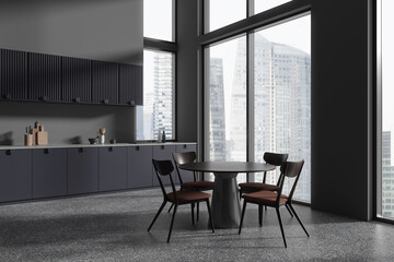 Grey home kitchen interior with dining and cooking corner, panoramic window