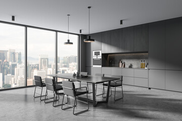 Gray and wooden kitchen corner with dining table