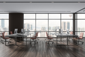 Stylish workplace interior with pc desktop and armchairs, panoramic window