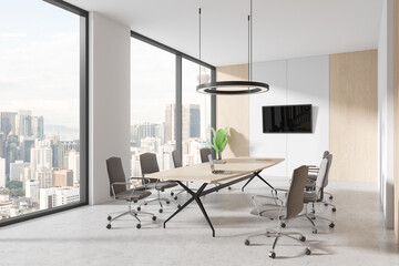 White and wooden office board room corner with TV