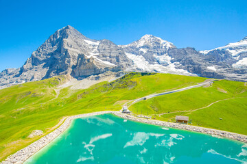 Swiss Alps and beautiful Fallboden lake near Kleine Scheidegg village, Jungfrau region, Switzerland