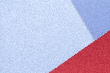 Texture of craft blue paper background with very peri and red border. Abstract sky cardboard.