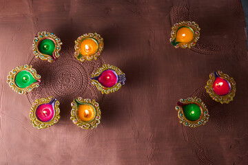 Burning diya on Happy Diwali, background for light festival of India