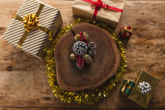 Beautiful christmas decorations and gifts on wooden countertop