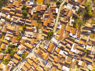 Fototapeta premium Drone Photography. Aerial Landscape Dense Residential Housing in the countryside of Bandung City - Indonesia. Aerial Photography. Top view