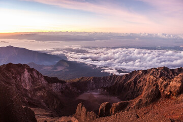 View from Mount Rinjani summit at sunrise. Beautiful mountain landscape at Lombok island, Indonesia.