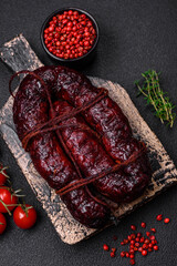 Delicious black blood sausage or black pudding with spices and herbs