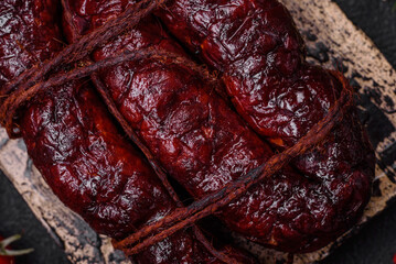 Delicious black blood sausage or black pudding with spices and herbs