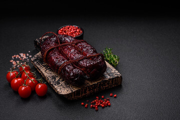Delicious black blood sausage or black pudding with spices and herbs