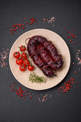 Delicious black blood sausage or black pudding with spices and herbs
