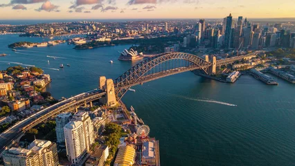 Raamstickers Sydney Harbour Bridge Aerial drone view of Sydney City and Sydney Harbour showing Sydney Harbour Bridge in the late afternoon     