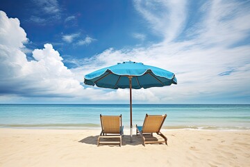 Fototapeta premium Peaceful Vacation Spot: Empty Beach with Chairs and Umbrella - Ultimate Relaxation Getaway