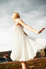 Dance, countryside and a woman for ballet in summer, freedom and happy on a rooftop. Nature, retro...
