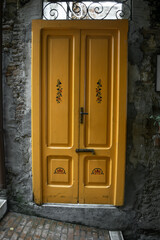 Close-up view of a yellow door