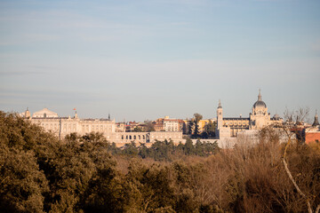 Skyline of Casa de Campo Lake in Madrid, Spain. Almudena Cathedral and the Royal Palace.