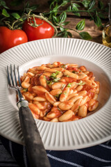 Cavatelli pasta with fresh tomato sauce.