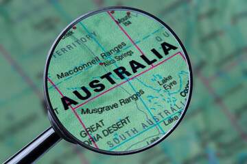 Map of AUSTRALIA through magnifying glass.