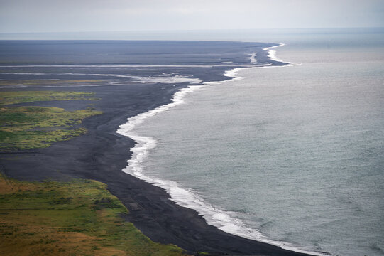 Coastline and black beach near Vik in Iceland