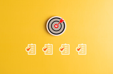 Target dartboard with work checklist for business objective target goal concept. Aiming dart board...