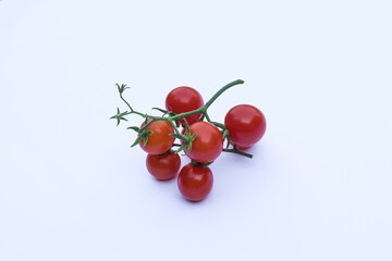 Fresh red tomatoes on a white background