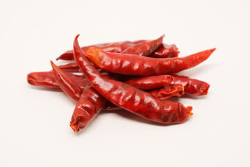 Closeup of Heap of Dried Red Chili Peppers Isolate on White Background