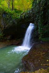 Fototapeta na wymiar Deliklikaya Waterfall is a wonderful waterfall formed by water flowing through the rock.