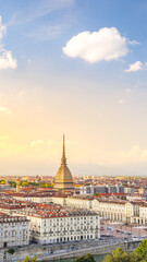 Turin, Italy. View from above on the city and the Mole Antonelliana at sunset. Vertical image....