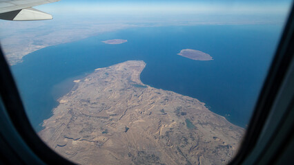 view of mountains and deserts from a passenger plane. Iran, Iraq, Persian Gulf