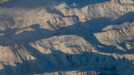 view of mountains and deserts from a passenger plane. Iran, Iraq, Persian Gulf