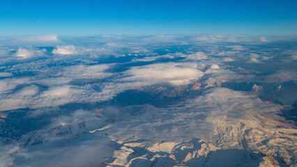 view of mountains and deserts from a passenger plane. Iran, Iraq, Persian Gulf