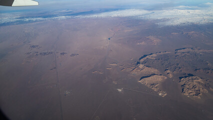 view of mountains and deserts from a passenger plane. Iran, Iraq, Persian Gulf