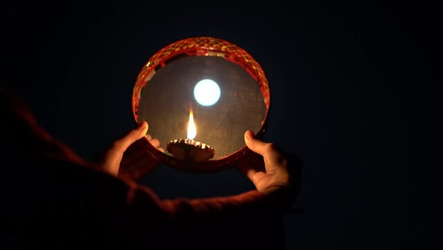 Karwa Chauth strainer and Diya oil lamps for the Karwa Chauth celebration on the night