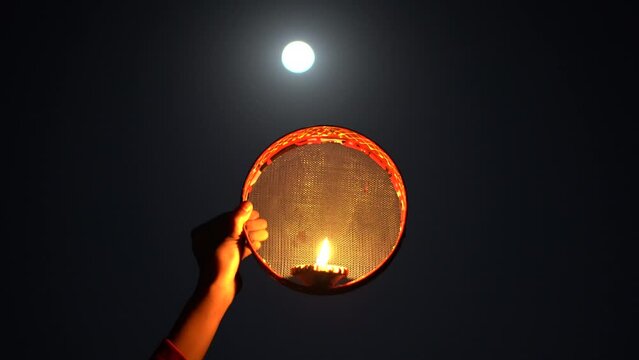 Karwa Chauth strainer and Diya oil lamps for the Karwa Chauth celebration on the night
