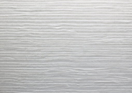 Ribbed paper texture closeup background