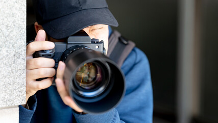 Fototapeta na wymiar カメラを構える男性